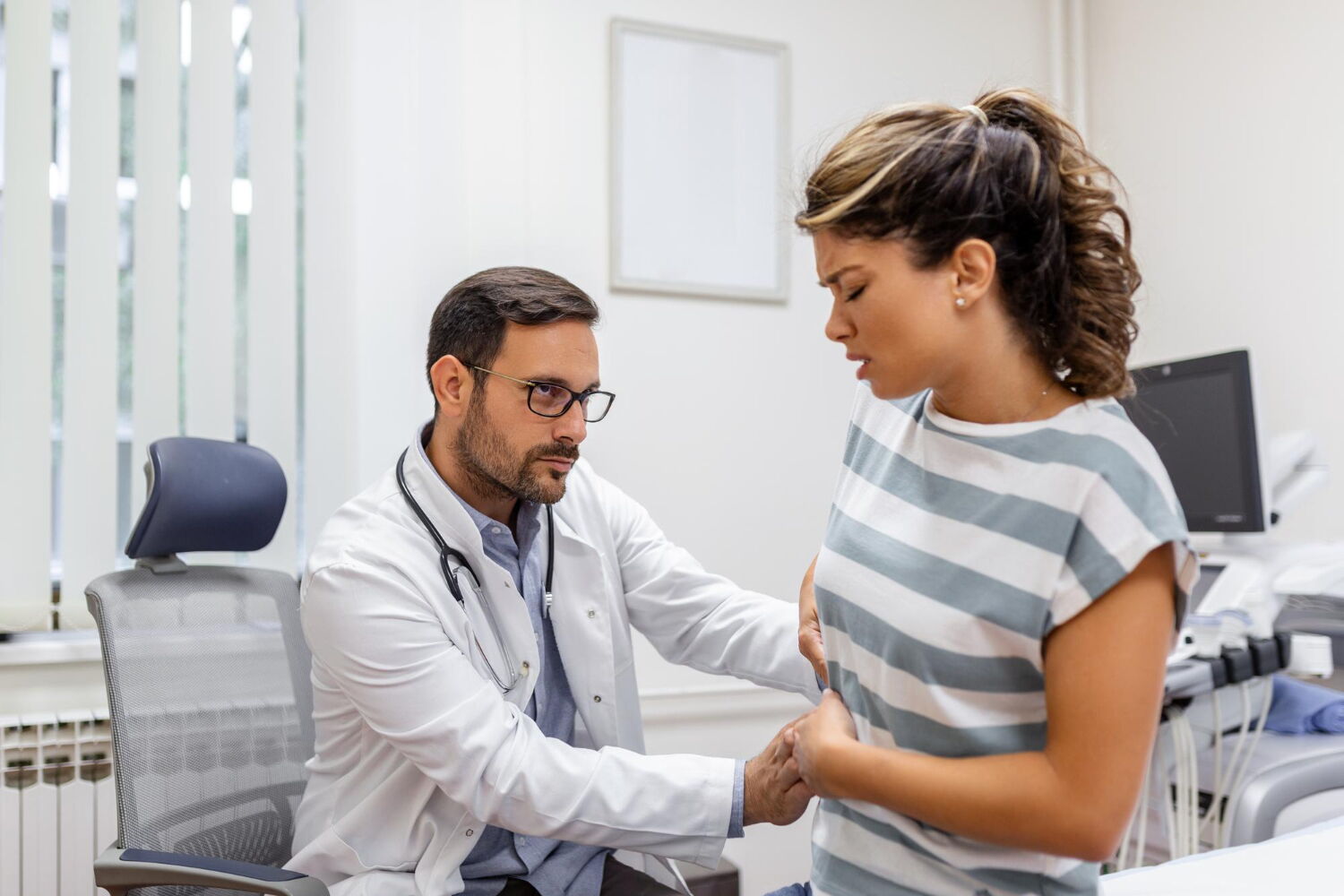 Nephrologist consulting kidney transplant patient